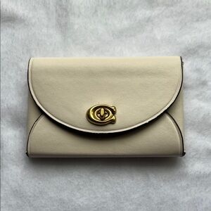 Coach Cream Leather Turnlock Clutch